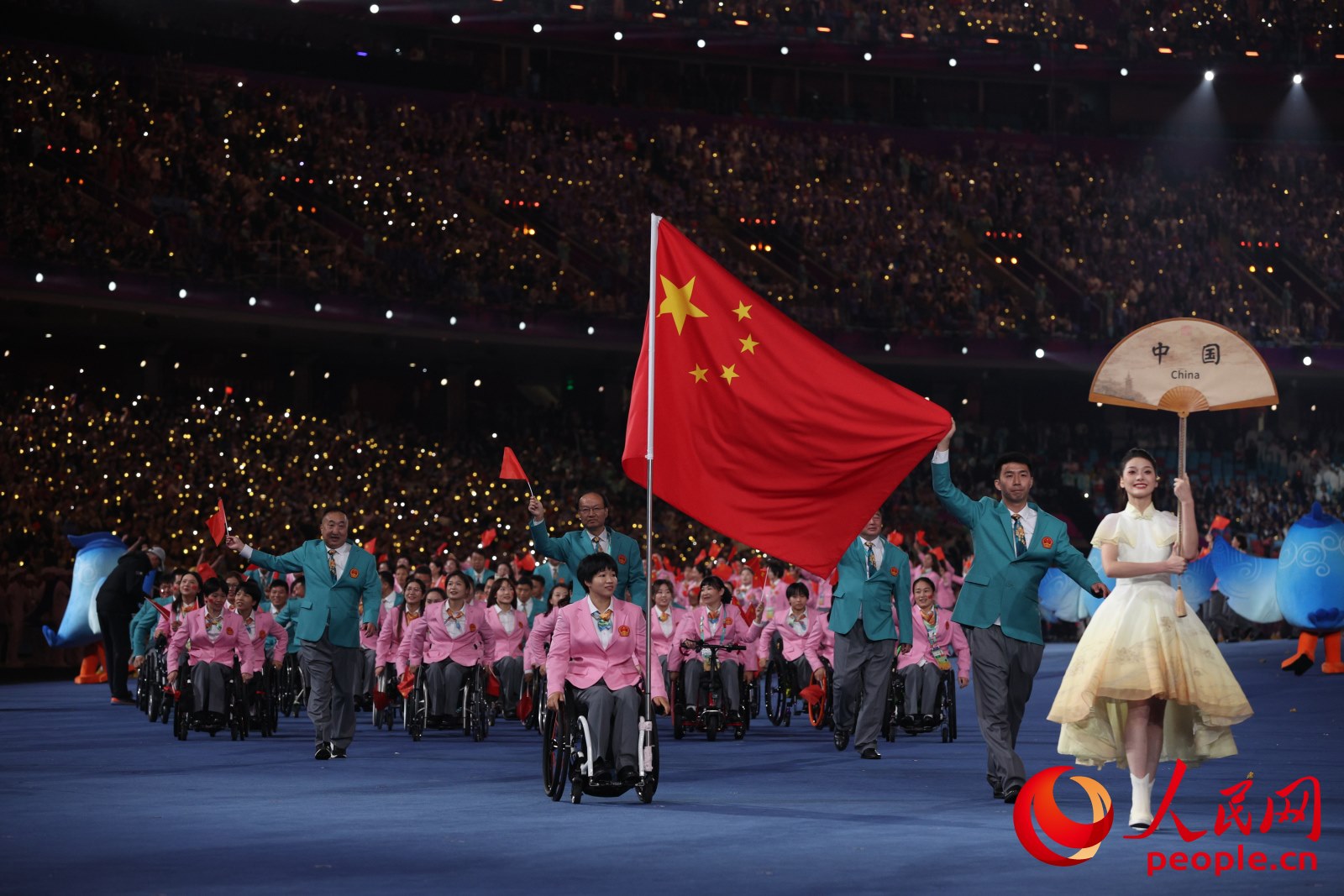 開幕式上，中國體育代表團入場。人民網(wǎng) 周靜圓攝